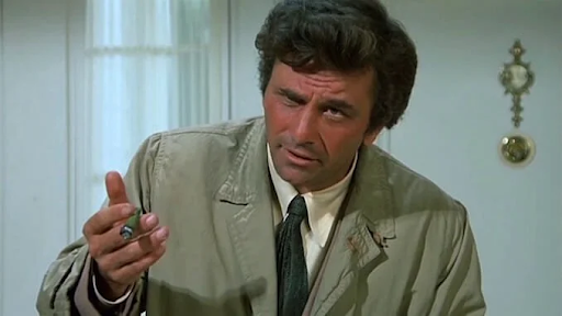 Columbo holding a cigar