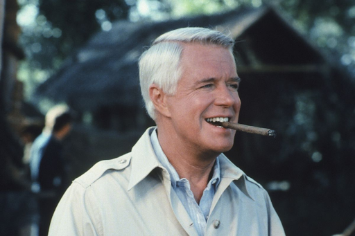 Hannibal from the Original A-Team smiling while holding a cigar